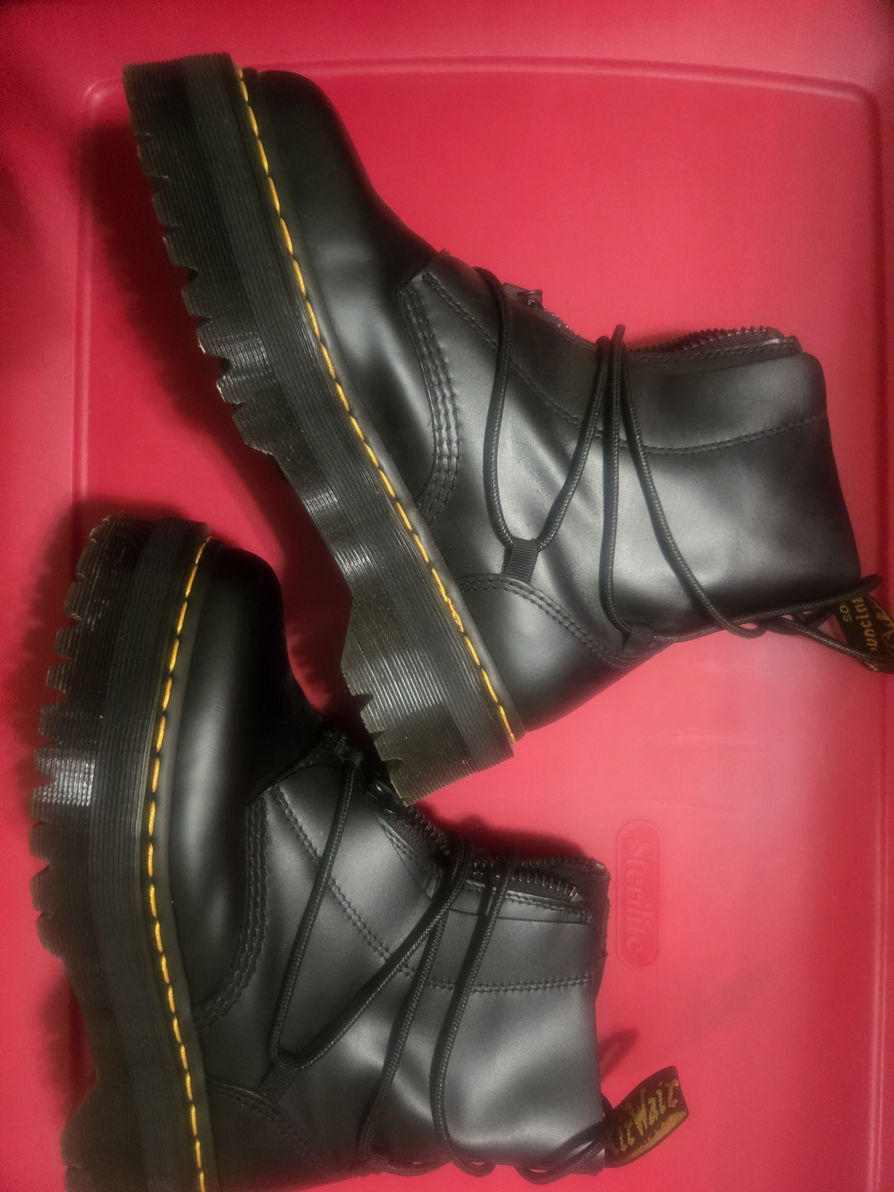 Dr. Martens Black Leather Combat Boots with Yellow Stitching Accent